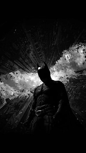 Batman standing in a destroyed cityscape with debris and smoke in black and white, Dark Batman Mobile for HD phone wallpaper