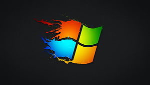 Windows 7 Logo with Vibrant Paint Splatter Effect on Dark Background HD wallpaper