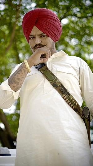 Sidhu Moose Wala in Red Turban and White Kurta with Bullet Bandolier HD phone wallpaper