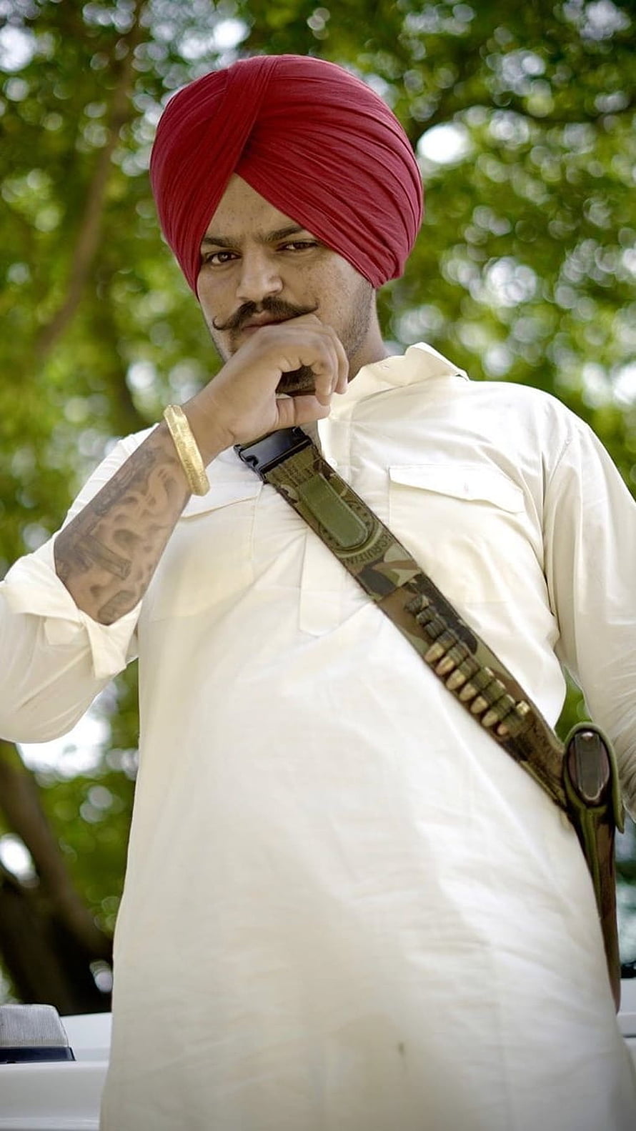 Sidhu Moose Wala in Red Turban and White Kurta with Bullet Bandolier HD phone wallpaper