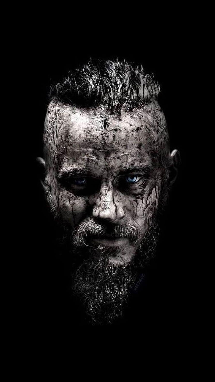 Intense Portrait of a Gritty Warrior with Blue Eyes and Mud-Covered Face HD phone wallpaper