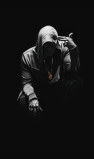 Mysterious Hooded Figure in Dark Shadows with Gold Chain HD phone wallpaper