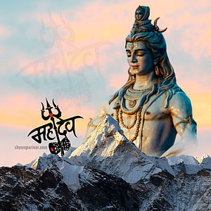 Majestic Shiva statue rising from snow-capped Himalayan peaks at sunset HD phone wallpaper