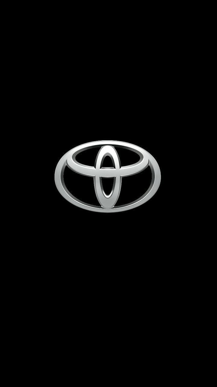 Sleek Silver Toyota Emblem Centered on a Minimalist Black Background HD phone wallpaper