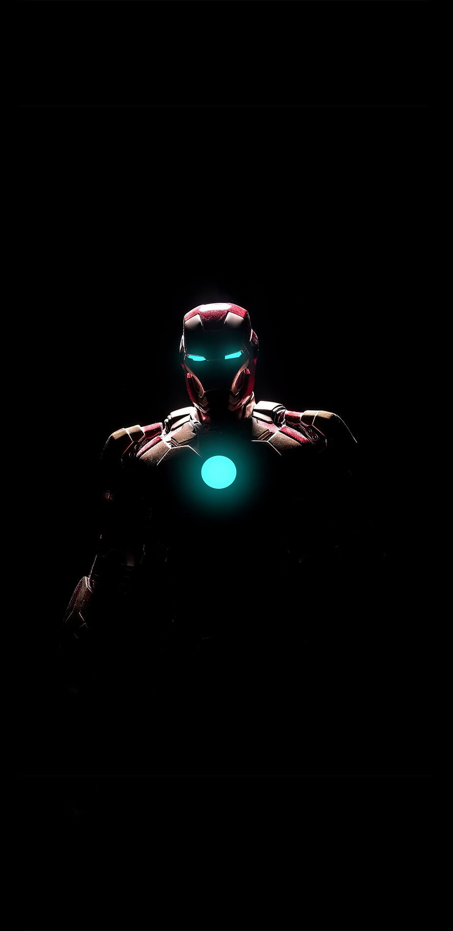 Iron Man glowing arc reactor and eyes in dark cinematic lighting, Amoled S6 Superhero , Amoled Superhero HD phone wallpaper