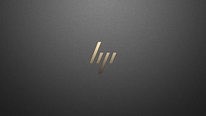 HP Spectre Gold Logo on Dark Gray Textured Surface HD wallpaper