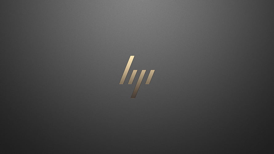 HP Spectre Gold Logo on Dark Gray Textured Surface HD wallpaper