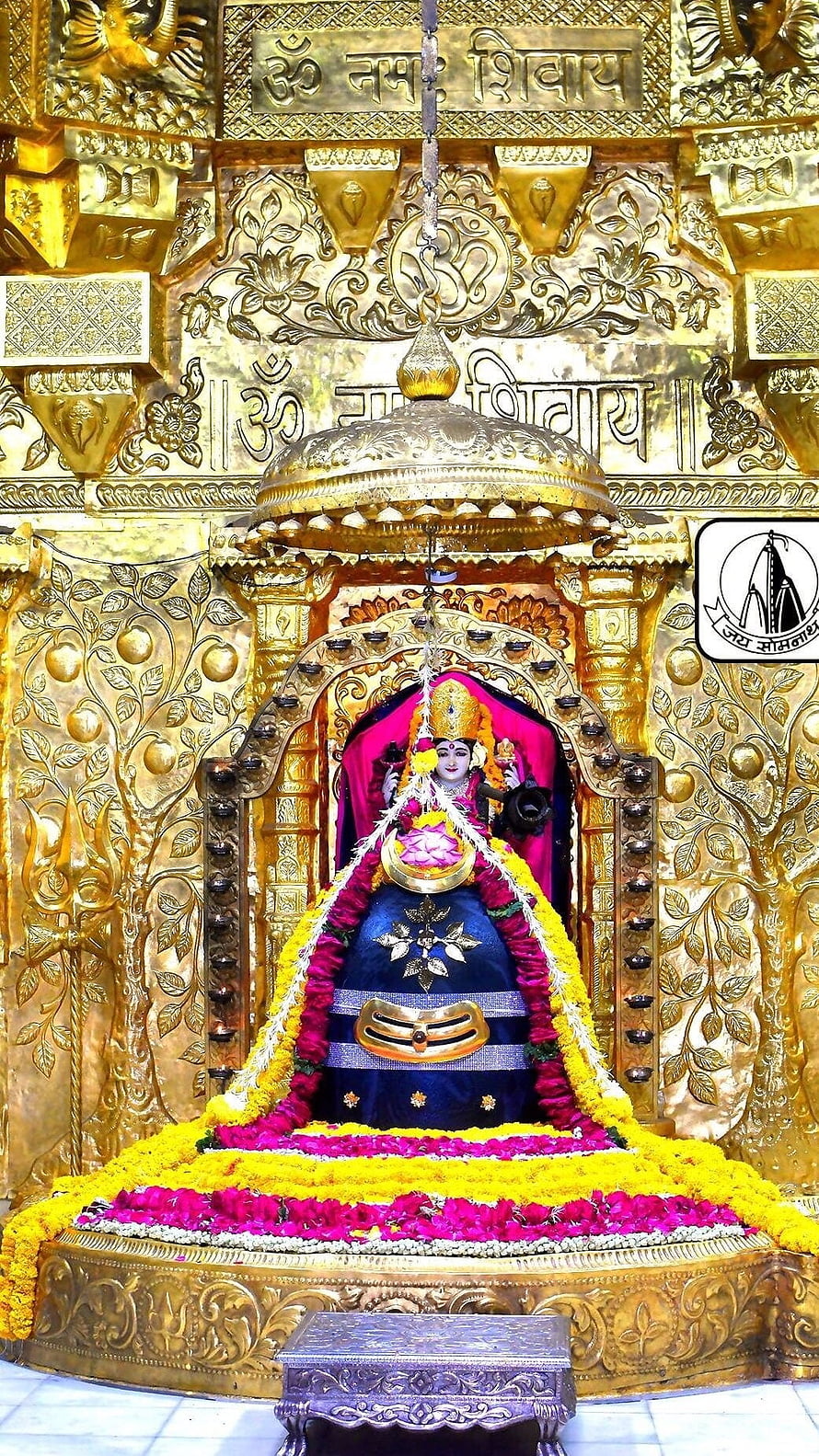 Golden Somnath Temple Idol of Goddess Amba Adorned with Flowers HD phone wallpaper