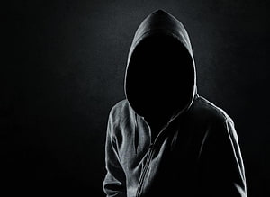 Mysterious Hooded Figure in Dark Shadow with Anonymous Silhouette HD wallpaper