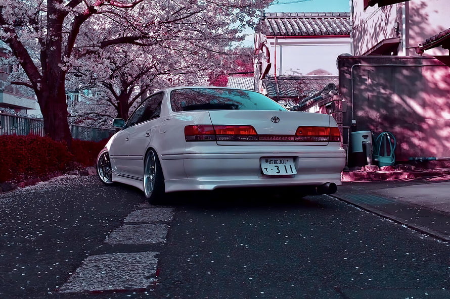 White Toyota Chaser JZX100 Stance Under Pink Cherry Blossoms HD wallpaper