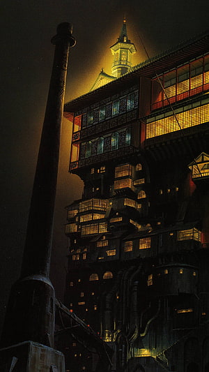 Studio Ghibli Nighttime Industrial Cityscape with Glowing Windows and Steampunk Architecture HD phone wallpaper