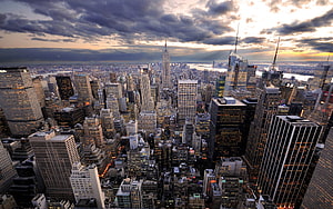 Aerial View of New York City Skyline at Dusk with Dramatic Clouds HD wallpaper