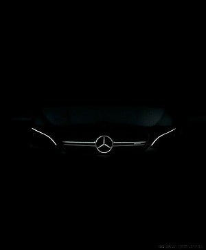 Mercedes-Benz AMG Front Grille and Emblem Illuminated in Darkness HD phone wallpaper