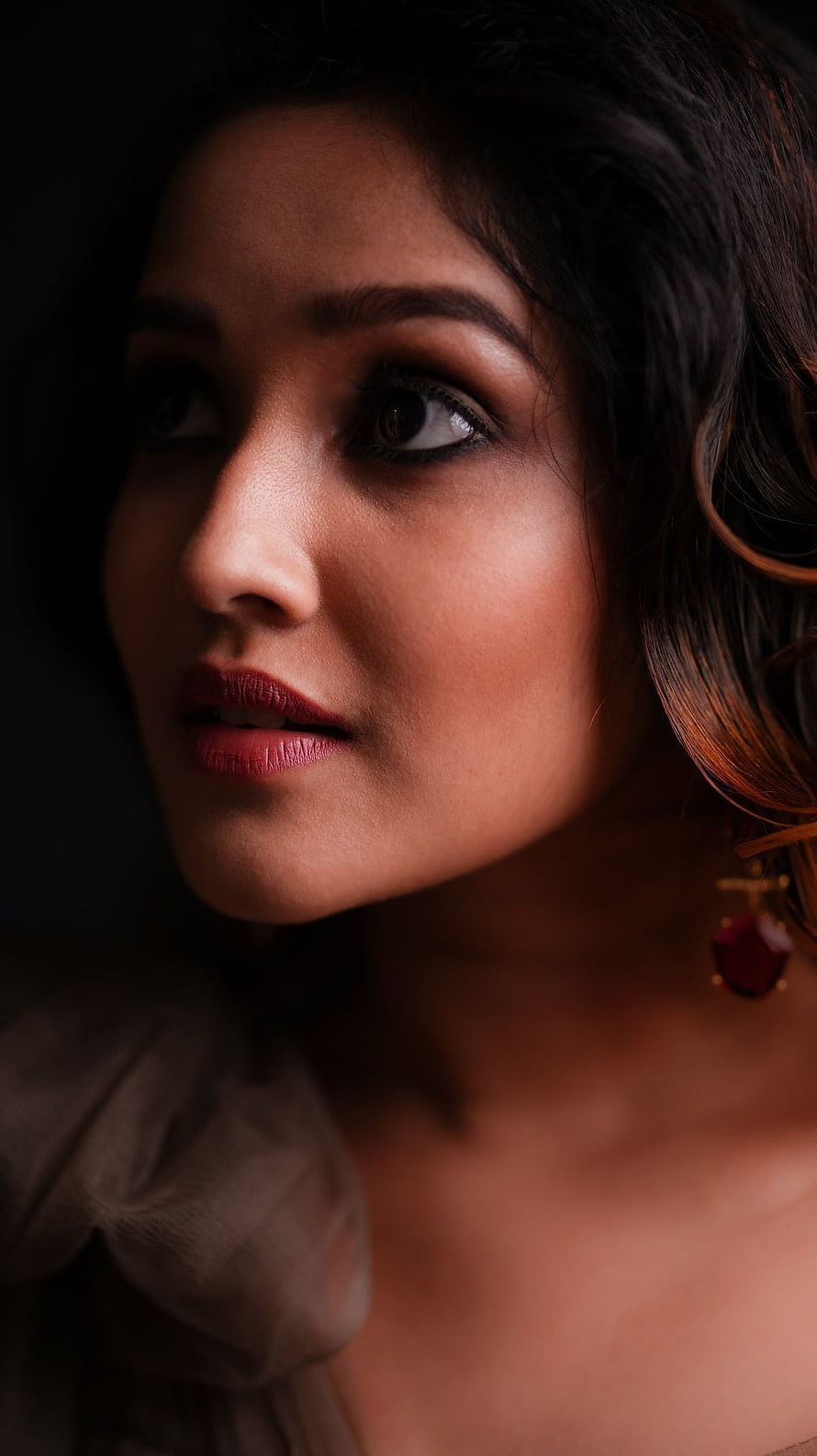 Anikha Surendran Dramatic Portrait with Dark Hair and Red Earring HD phone wallpaper