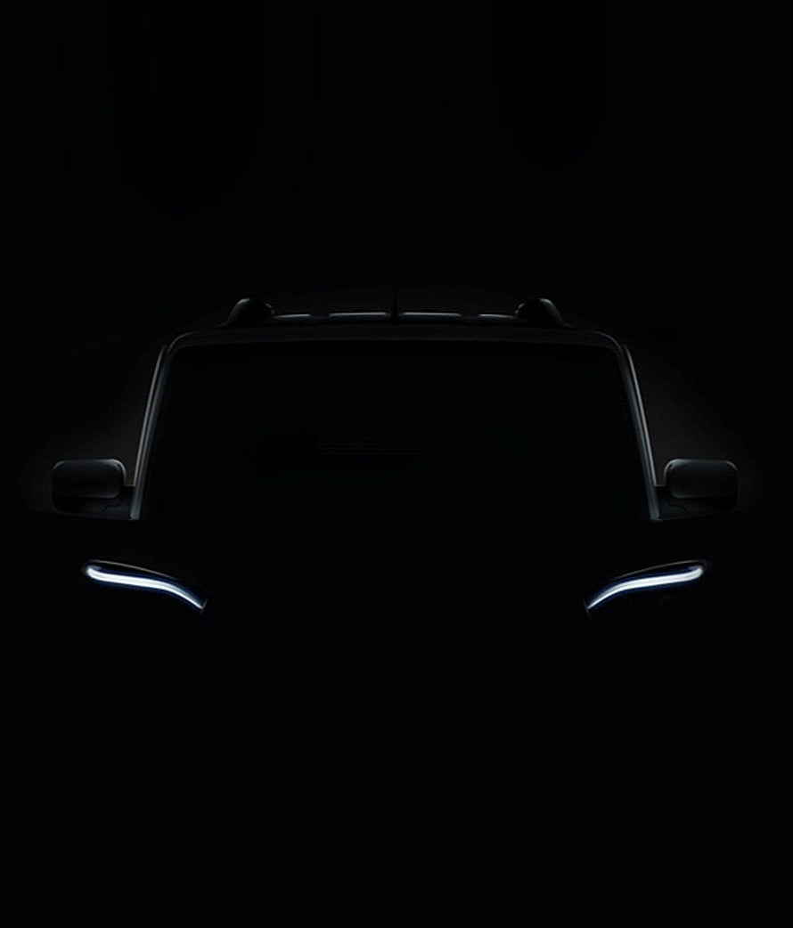 Mysterious Car Teaser with Glowing Headlights in Darkness HD phone wallpaper