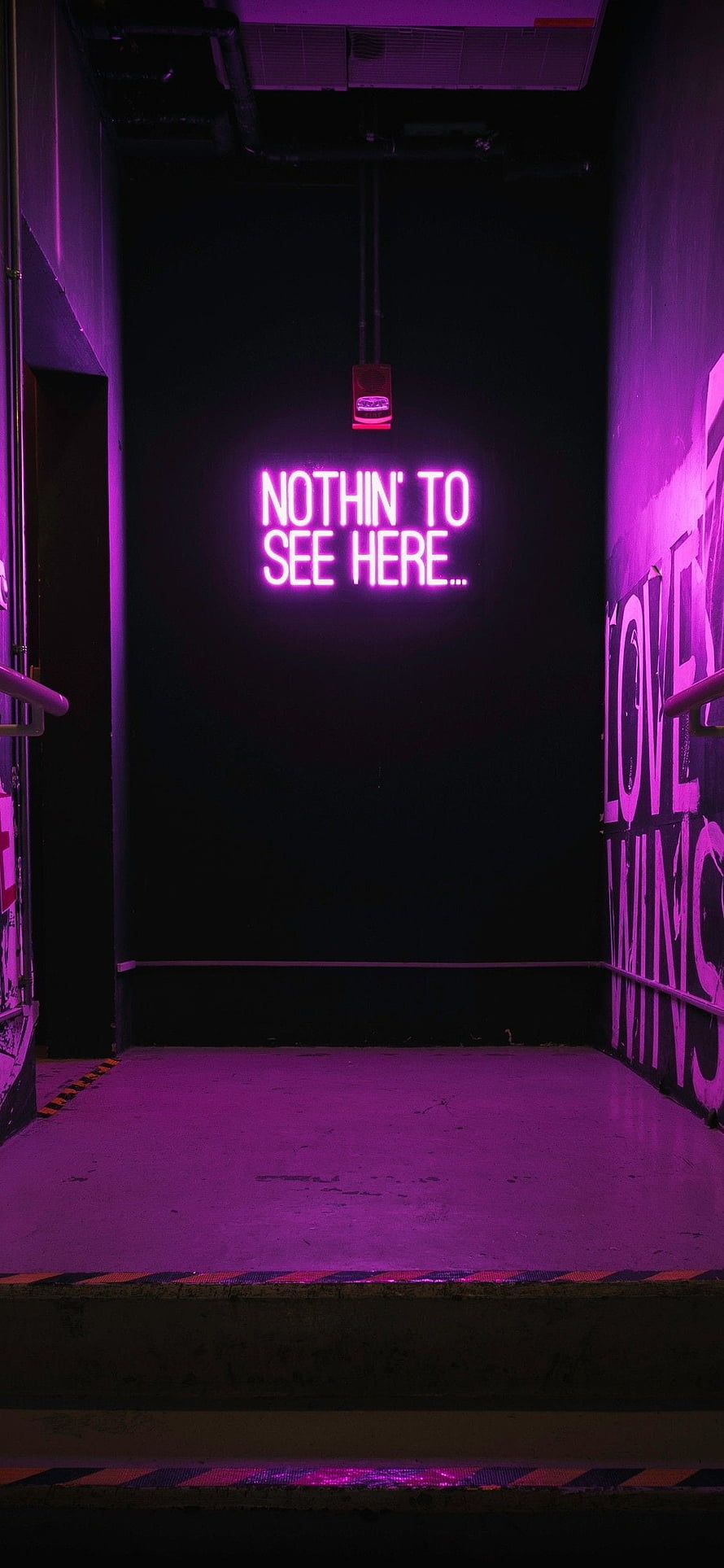 Purple Neon Sign in Dark Parking Garage with Graffiti Walls HD phone wallpaper