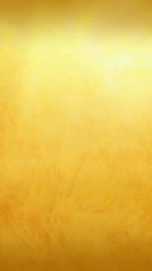 Golden Yellow Textured Background With Soft Gradient And Subtle Brush Strokes HD phone wallpaper