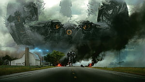Lockdown Confronts Bumblebee on a Rural Road in Transformers Dark of the Moon HD wallpaper