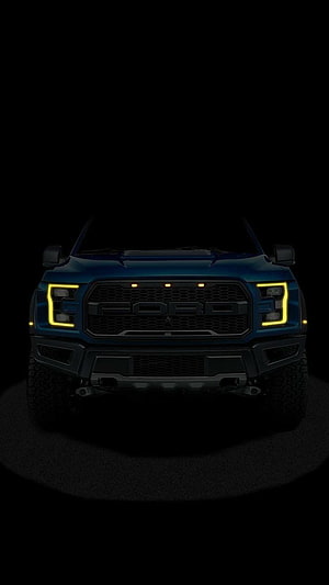 Ford Ranger Raptor Front Grille with Yellow LED Headlights in Dark Studio Setting HD phone wallpaper