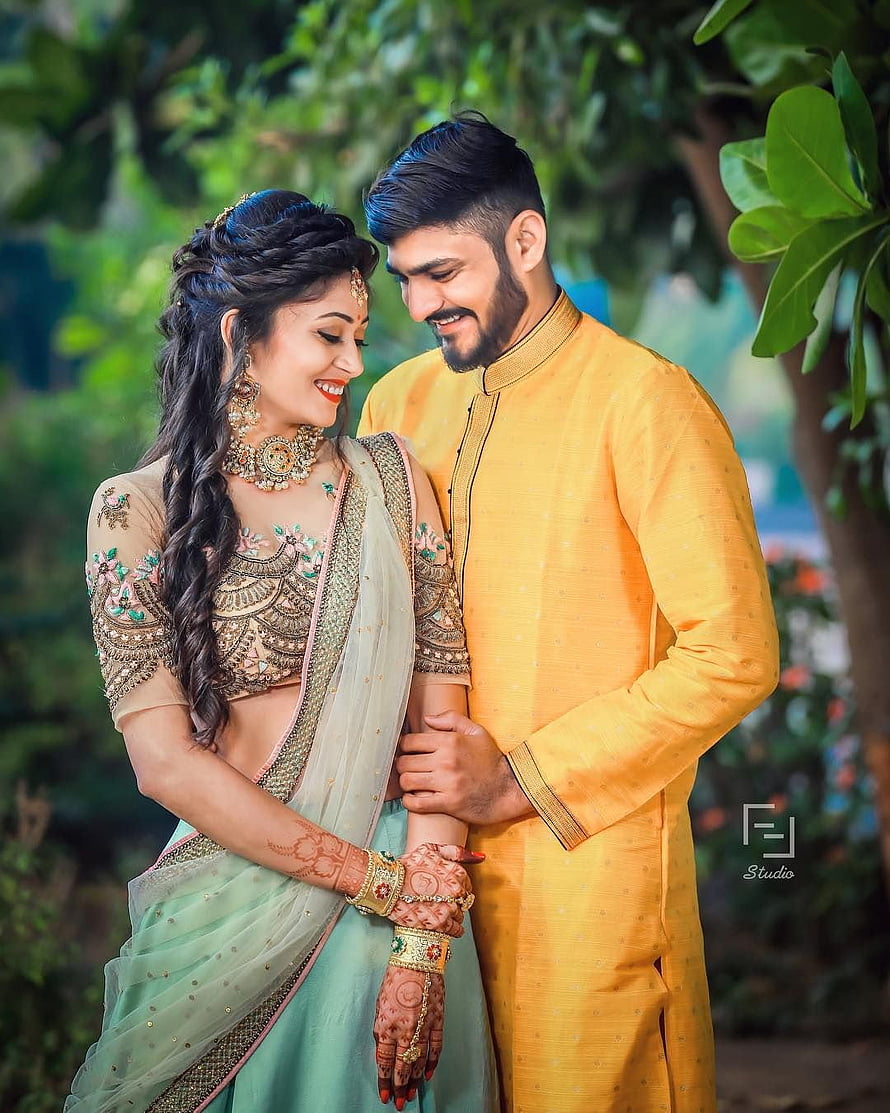 Indian Couple in Traditional Wedding Attire with Henna and Jewelry HD phone wallpaper