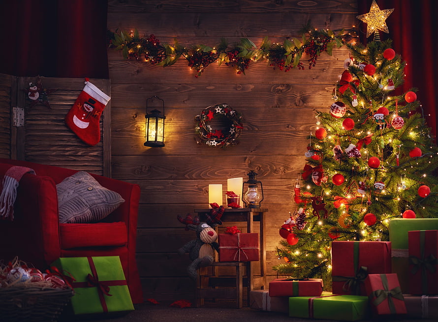 Cozy Christmas Living Room with Decorated Tree, Red Armchair, and Festive Gifts HD wallpaper