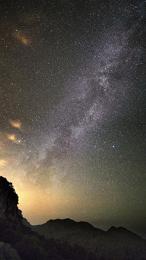 Stunning Milky Way Galaxy Over Silhouetted Mountain Ridge Night Sky Photography HD phone wallpaper