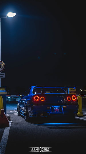 Blue Nissan GT-R R35 Rear View at Night with LED Taillights and Street Lighting HD phone wallpaper