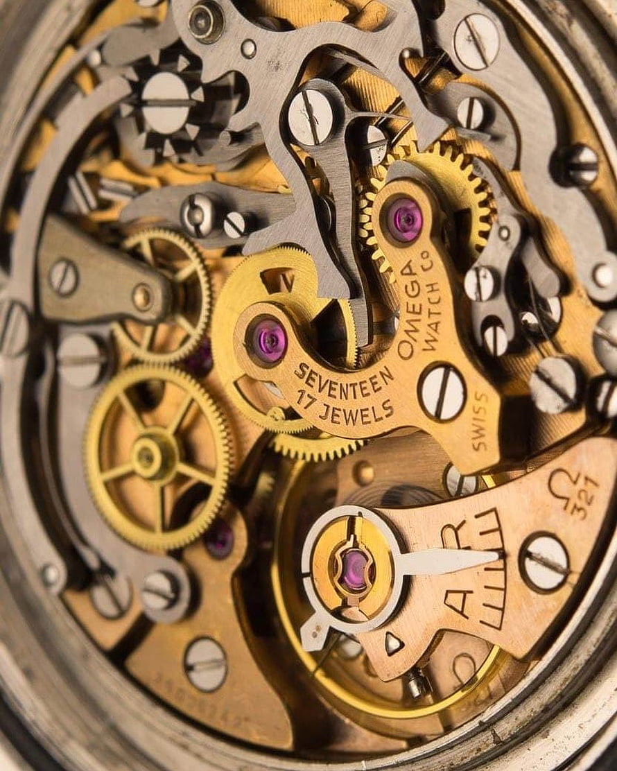 Omega Watch Movement Macro: Intricate Gears, Jewels, and Swiss Mechanical Engineering HD phone wallpaper