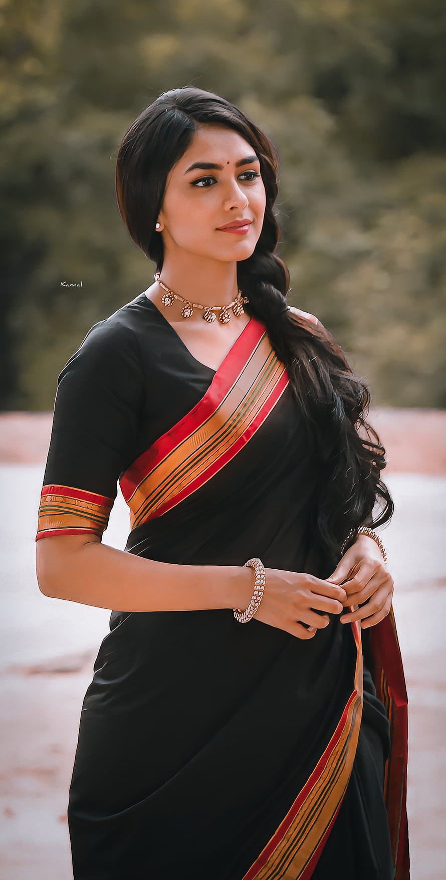 Pooja Hegde in a Black Saree with Red and Gold Border HD phone wallpaper