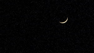 Crescent Moon Glowing in a Starry Night Sky HD wallpaper