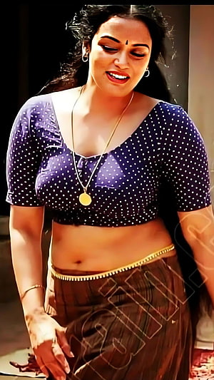 Swetha Menon in a Polka Dot Crop Top and Traditional Brown Skirt HD phone wallpaper