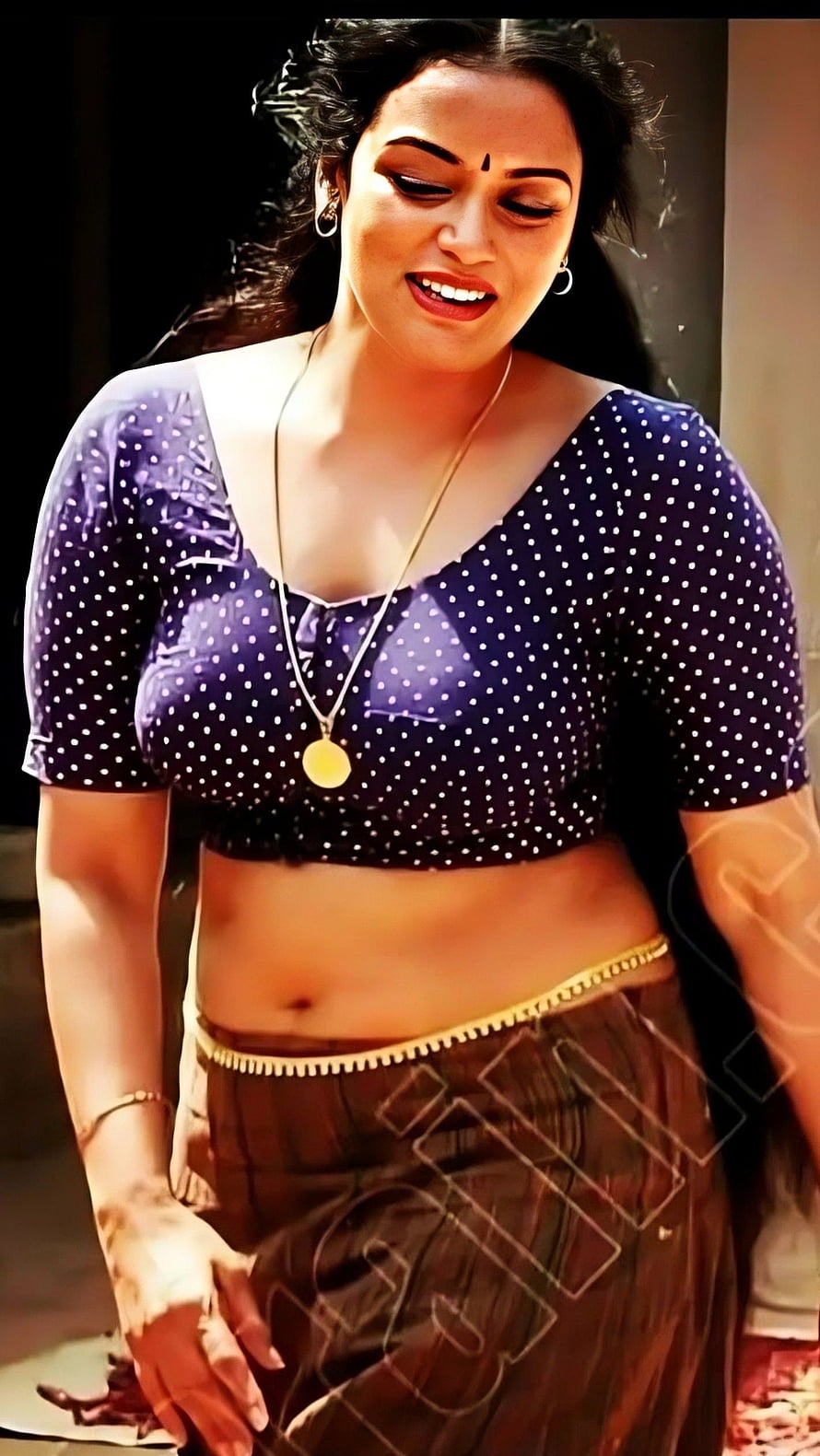 Swetha Menon in a Polka Dot Crop Top and Traditional Brown Skirt HD phone wallpaper