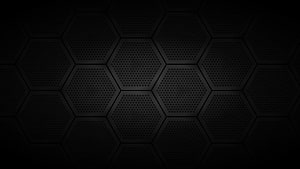 Dark metallic honeycomb hexagon pattern with perforated texture and industrial carbon fiber aesthetic HD wallpaper