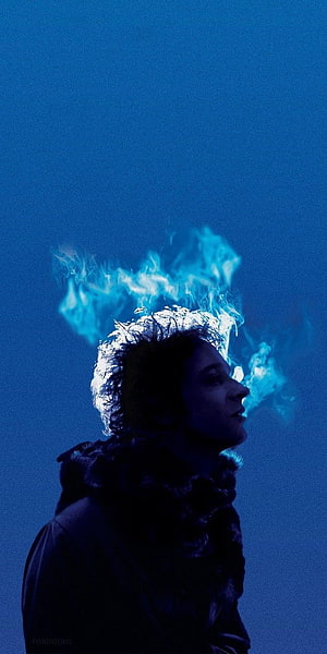 Silhouette of a person with blue flames burning on their head against a dark blue background HD phone wallpaper