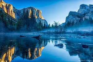 Misty Morning Reflections in Yosemite Valley with Golden Granite Cliffs HD wallpaper