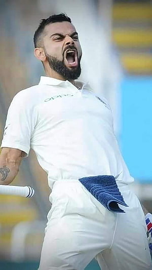 Virat Kohli Celebrating in White Test Cricket Kit with Bat and Towel HD phone wallpaper