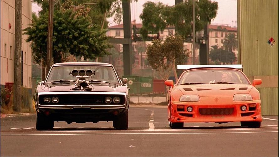 Dodge Charger and Toyota Supra Street Racing Scene from Fast and Furious HD wallpaper