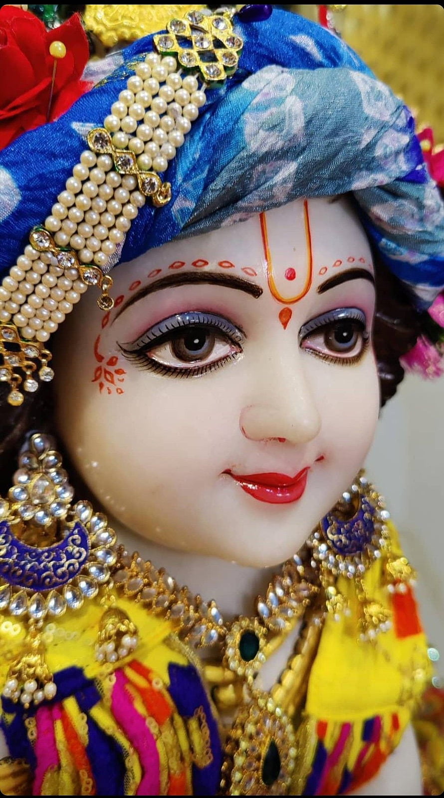 Close-up Portrait of Baby Krishna Idol with Blue Turban and Gold Jewelry HD phone wallpaper