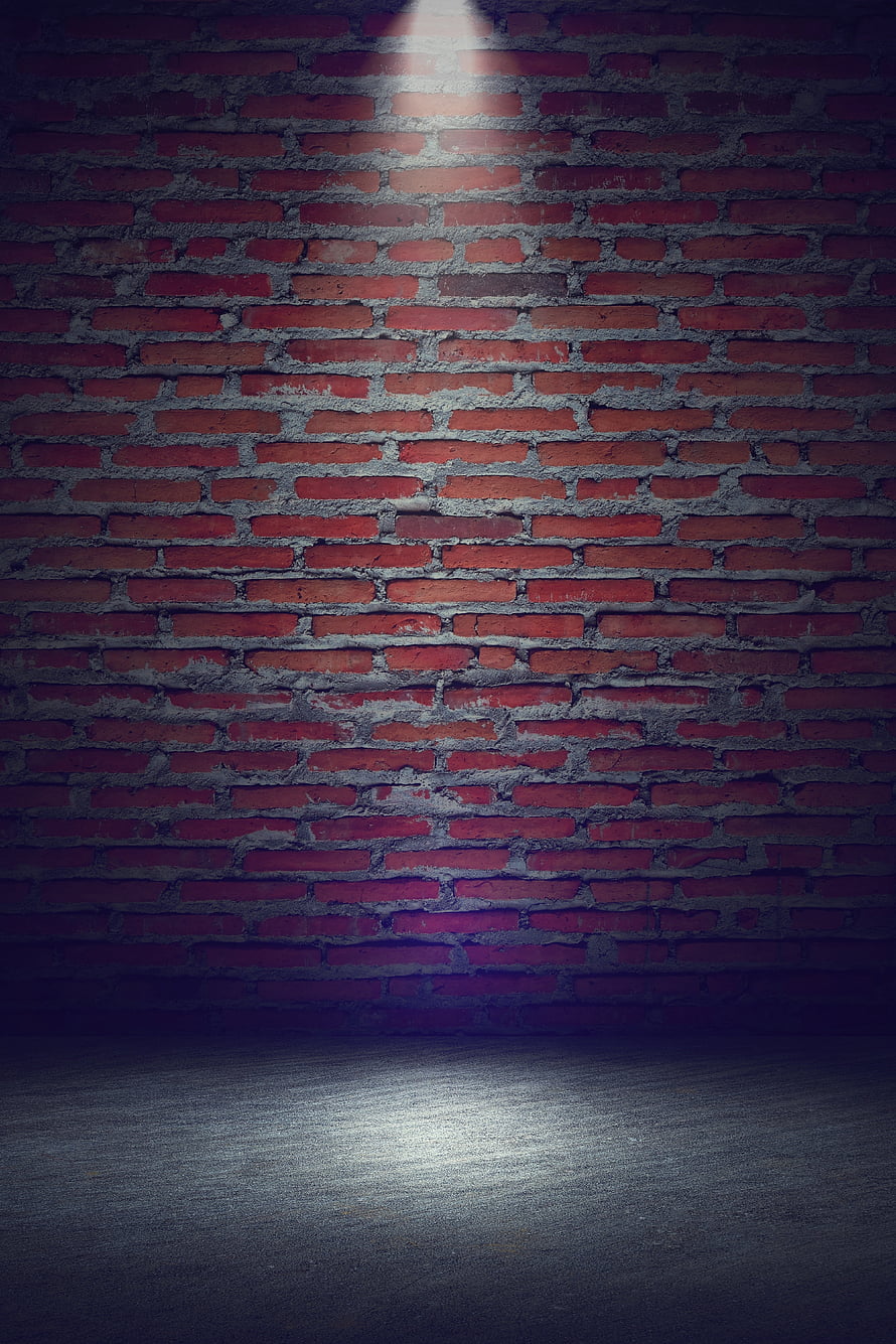 Dark Red Brick Wall Background With Spotlight On Concrete Floor HD phone wallpaper