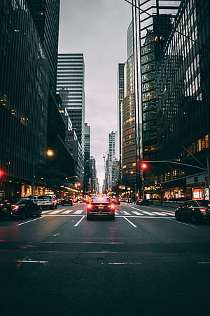 New York City Street Scene at Dusk with Traffic and Skyscrapers HD phone wallpaper