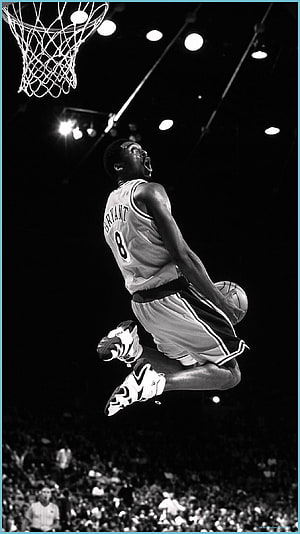 Kobe Bryant in Action: Dynamic Black and White Basketball Dunk HD phone wallpaper