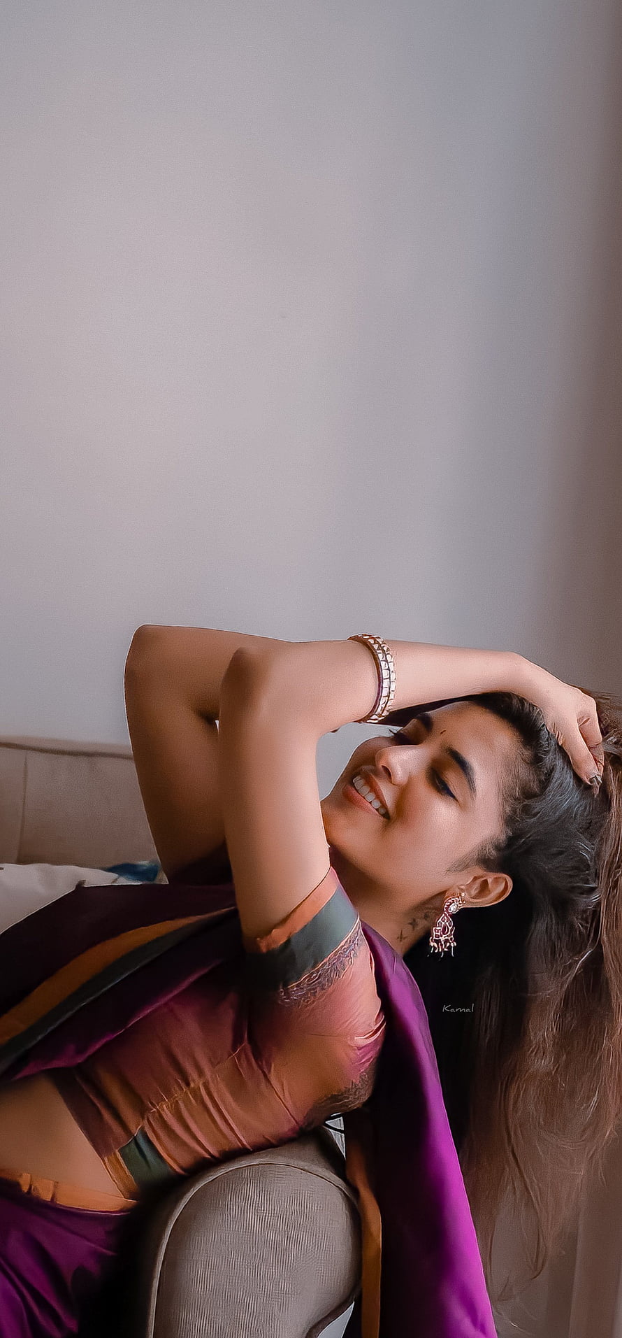 Woman in Purple Saree Lying on Sofa with Hand Behind Head, Priyanka arul Mohan, Priyanka_Mohan, Priyanka_arul_mohan HD phone wallpaper