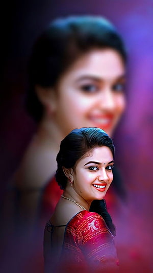 Nayanthara smiling portrait in red saree with gold jewelry and traditional hairstyle HD phone wallpaper