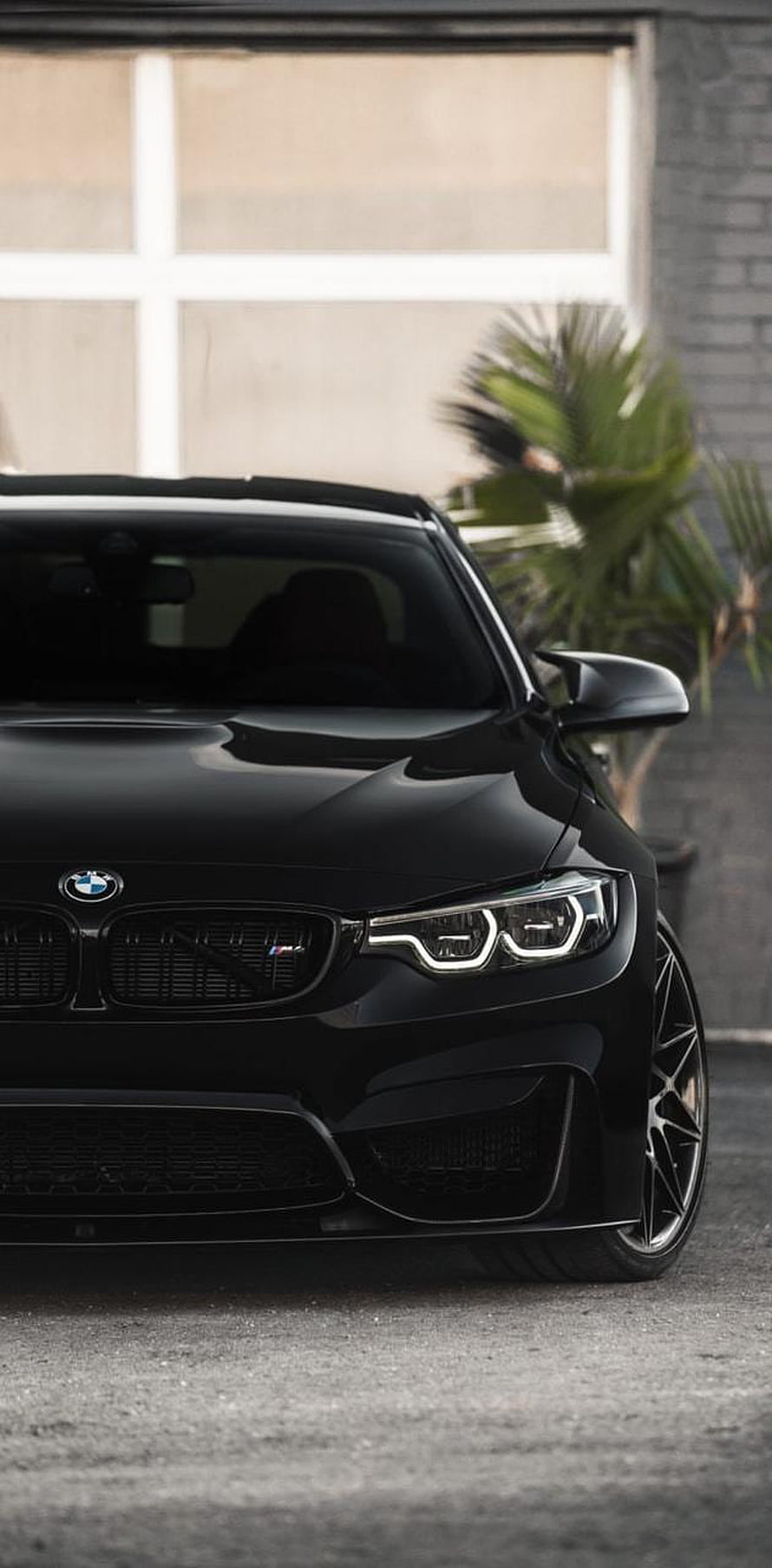 Sleek Black BMW M3 Sedan Front View with Aggressive Grille and LED Headlights HD phone wallpaper