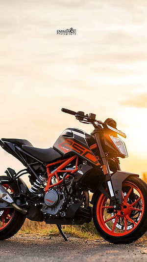 KTM Duke 390 Naked Motorcycle in Orange and Black at Golden Hour HD phone wallpaper