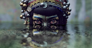 Mystical Asian Goddess Face Peeking Over Water With Intricate Silver Headdress And Reflection HD wallpaper