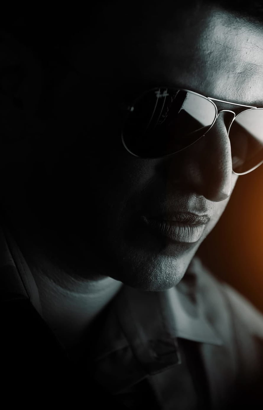Mysterious man in sunglasses with dramatic lighting and shadowy atmosphere, Puneeth Rajkumar, , Kannada, OnePlus, POWER, Trending, Appu, Kannadiga, PuneethRajkumar HD phone wallpaper