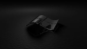 Glossy Black Windows Logo on Dark Surface HD wallpaper