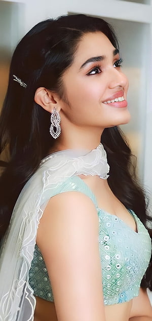 Disha Patani in a mint green embroidered blouse with white ruffled dupatta and diamond earrings HD phone wallpaper