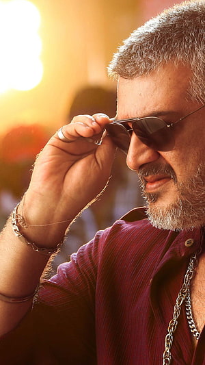 Portrait of a stylish man with grey beard adjusting sunglasses in warm sunlight, Ajith kumar AK, #ajith, thala HD phone wallpaper